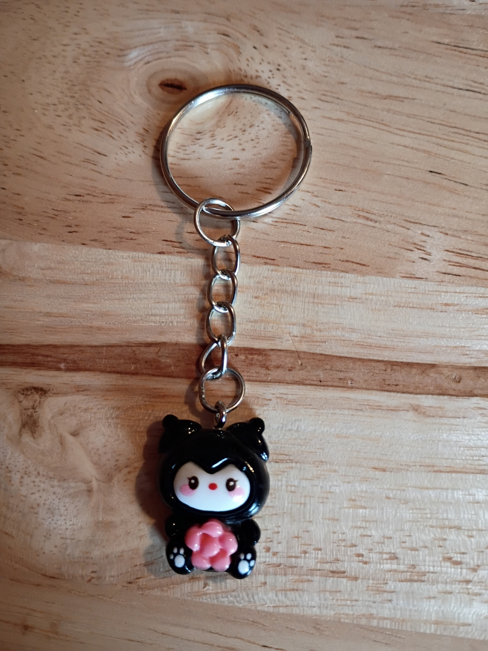 Sanrio Kuromi In A Black Hood Holding A Flower Keychain Animation Character
